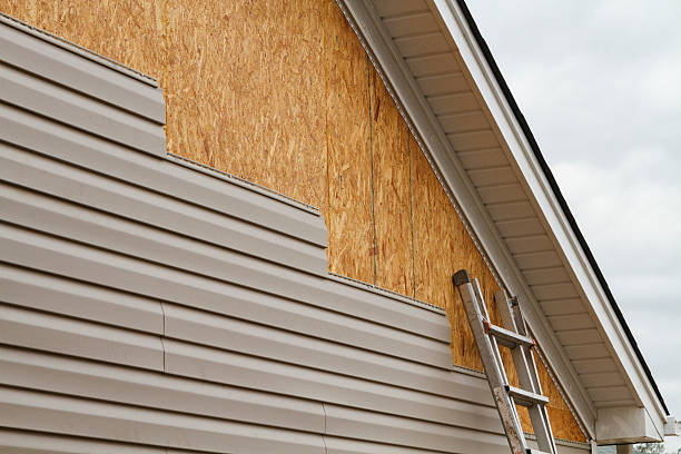 Professional Siding Contractor technician working in Hampton, VA